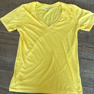 trouvé yellow v-neck t- shirt. Size medium, like new.
